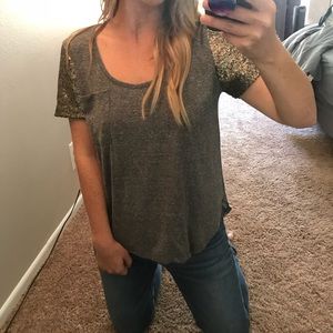 Sequenced sleeve high low top